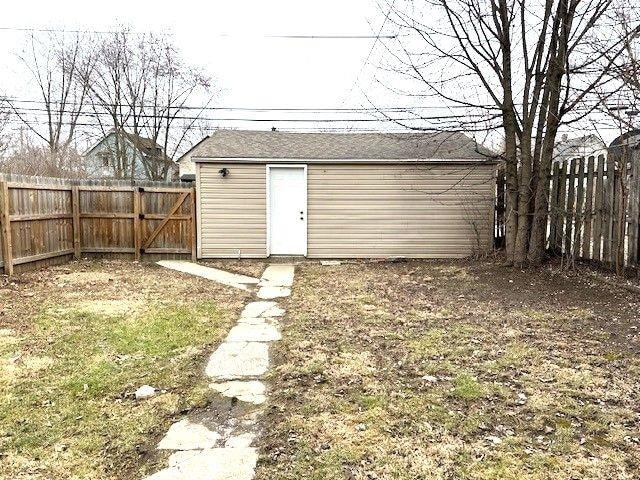 view of outbuilding with an outbuilding and a fenced backyard