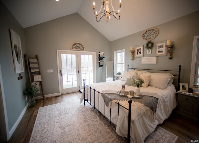 bedroom with high vaulted ceiling, a notable chandelier, wood finished floors, baseboards, and access to exterior