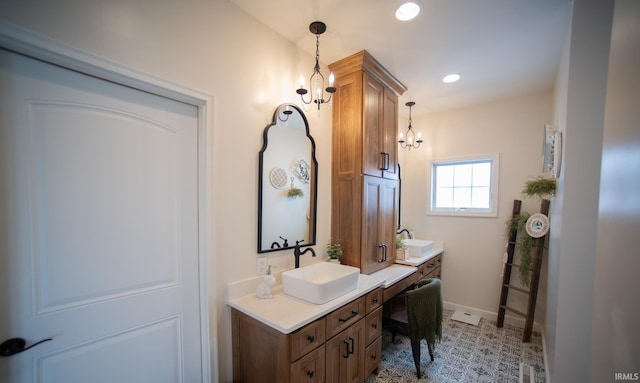 bathroom featuring recessed lighting, vanity, and baseboards