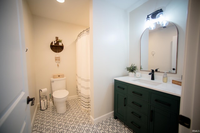 full bathroom with visible vents, baseboards, vanity, and toilet