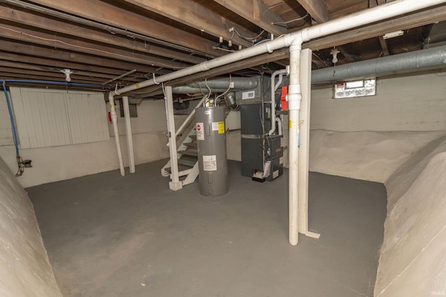 below grade area with electric water heater, stairway, and heating unit