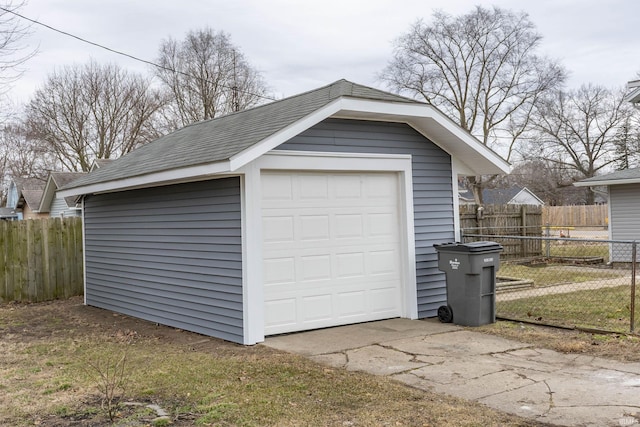 detached garage with fence