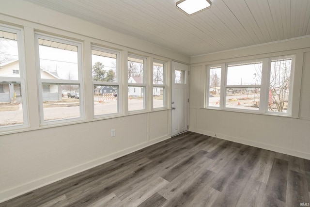 unfurnished sunroom featuring wood ceiling