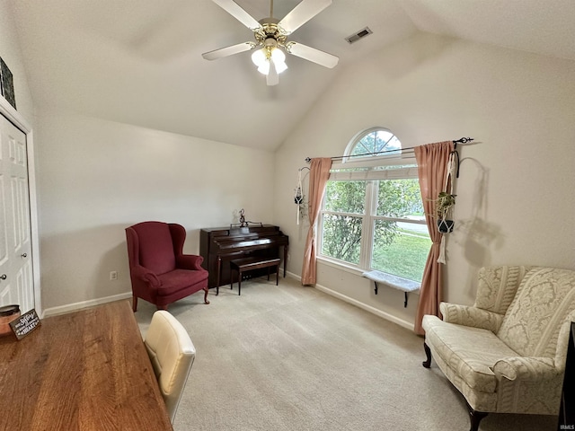 sitting room featuring ceiling fan, high vaulted ceiling, carpet flooring, visible vents, and baseboards