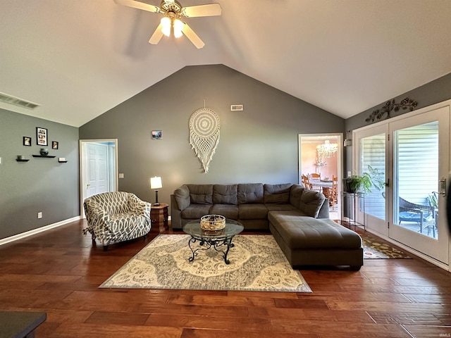 living area featuring lofted ceiling, hardwood / wood-style flooring, ceiling fan, and visible vents