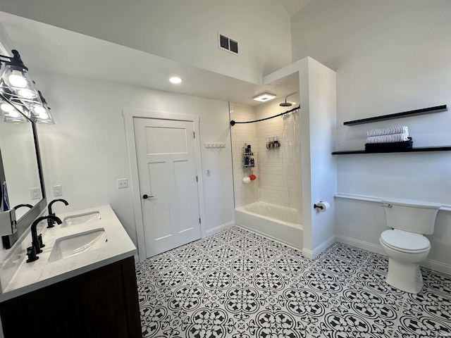 full bathroom with baseboards, visible vents, a sink, and toilet