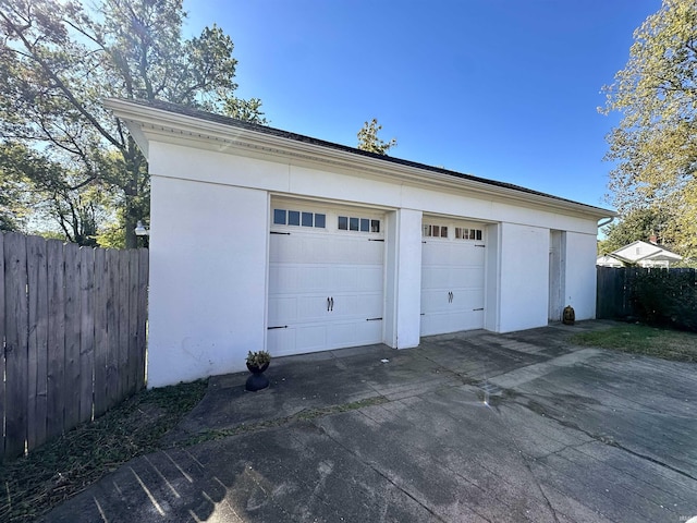 detached garage with fence