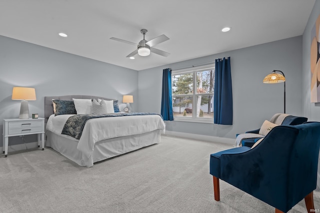 carpeted bedroom featuring a ceiling fan, recessed lighting, and baseboards