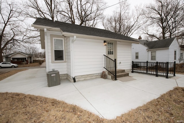 exterior space with entry steps and a patio