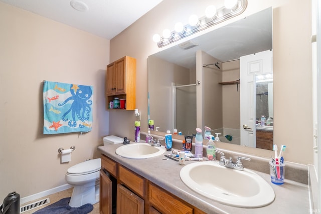 full bathroom with visible vents, a sink, a shower stall, and double vanity