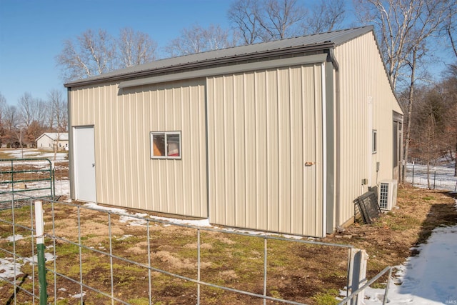 view of outdoor structure with fence