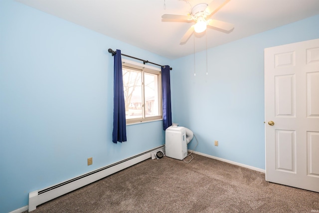 unfurnished room with carpet floors, a baseboard radiator, baseboards, and ceiling fan