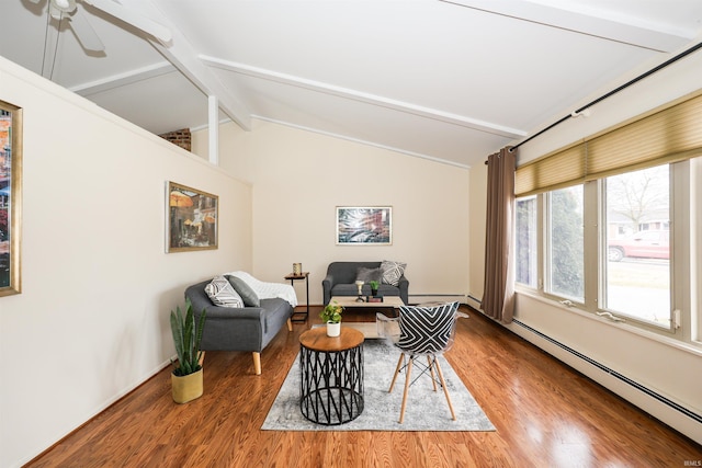 living area with lofted ceiling with beams, a baseboard radiator, and wood finished floors