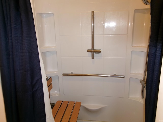 bathroom featuring a shower with curtain