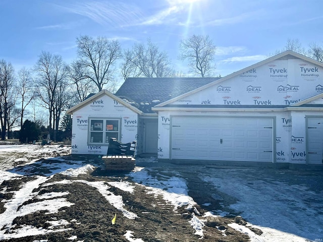 property in mid-construction featuring a garage