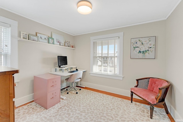 home office featuring ornamental molding, baseboards, and wood finished floors