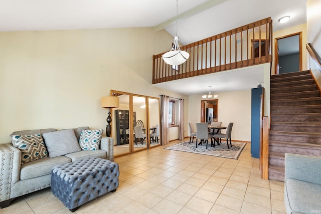 living area featuring light tile patterned floors, high vaulted ceiling, a chandelier, stairway, and beam ceiling