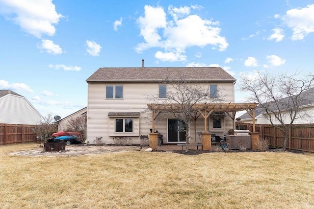 rear view of house featuring a fenced backyard, a lawn, a pergola, and a patio