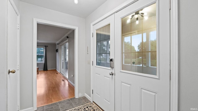 doorway with baseboards