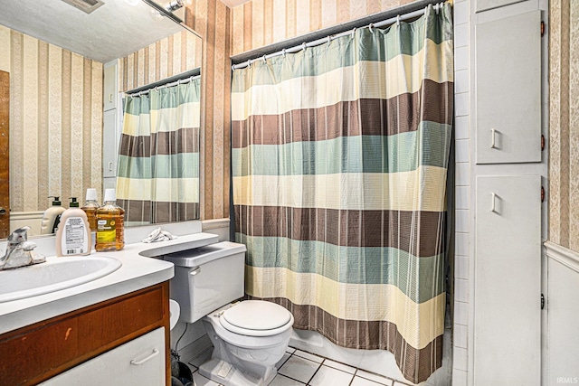 bathroom featuring tile patterned flooring, toilet, a shower with shower curtain, vanity, and wallpapered walls