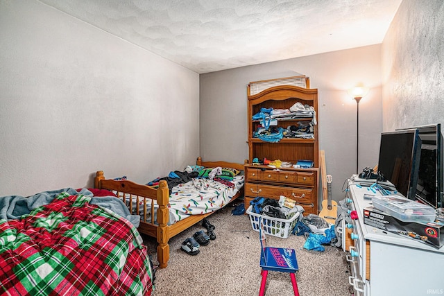 bedroom featuring carpet