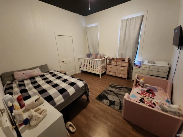 bedroom featuring wood finished floors