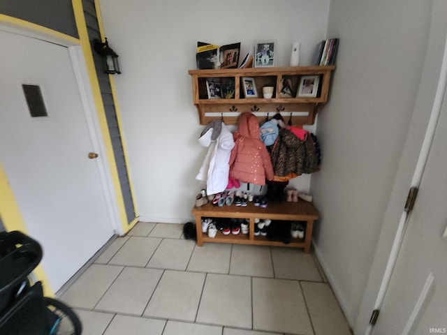 mudroom with tile patterned floors