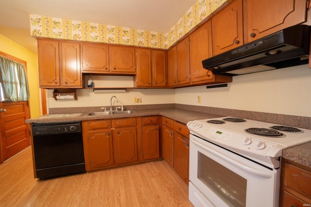 kitchen featuring light wood finished floors, white electric stove, dishwasher, under cabinet range hood, and a sink