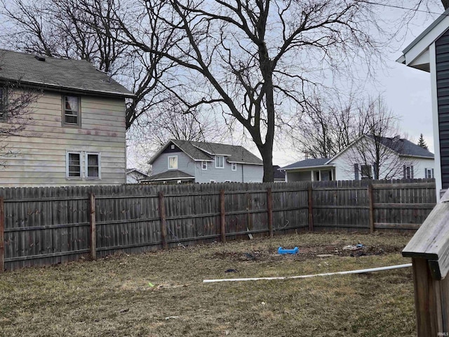 view of yard with a fenced backyard