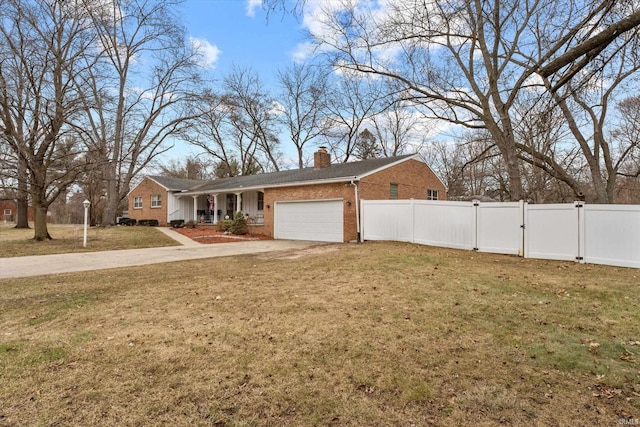 view of front of property with brick siding, a front yard, and fence