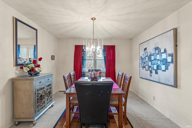 carpeted dining space featuring a notable chandelier