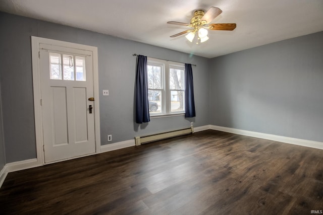 foyer with baseboards, a baseboard heating unit, ceiling fan, and dark wood-style flooring