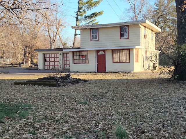 view of front of house featuring brick siding and an attached garage