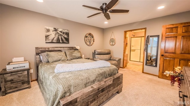 bedroom with light carpet, ceiling fan, ensuite bathroom, and recessed lighting