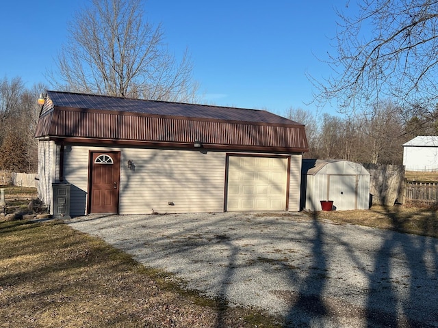 detached garage with fence