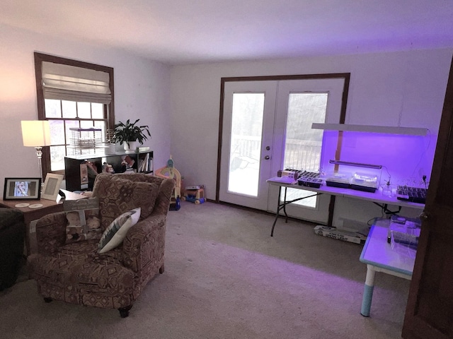 living room with french doors and carpet flooring