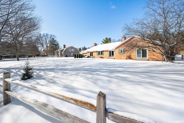 view of snowy yard