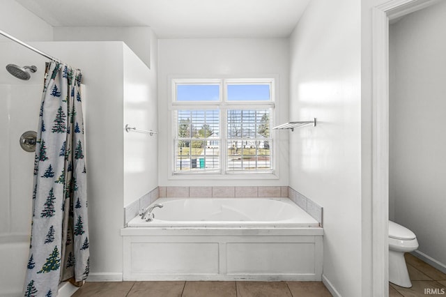 full bathroom with baseboards, a shower with shower curtain, toilet, tile patterned floors, and a bath