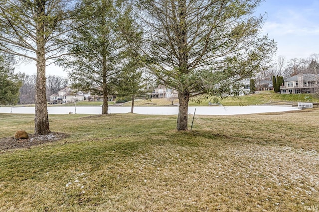 view of yard featuring a water view