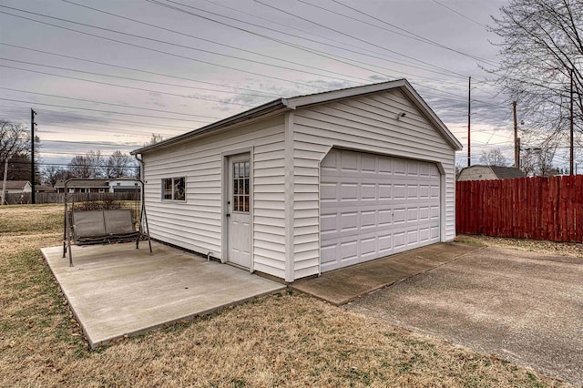 detached garage with fence