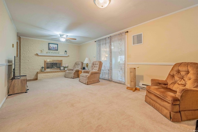 sitting room featuring a baseboard heating unit, carpet, visible vents, and crown molding