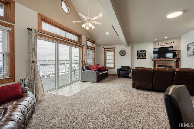 living room featuring light carpet, light tile patterned floors, high vaulted ceiling, and recessed lighting