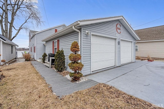 view of property exterior featuring a garage