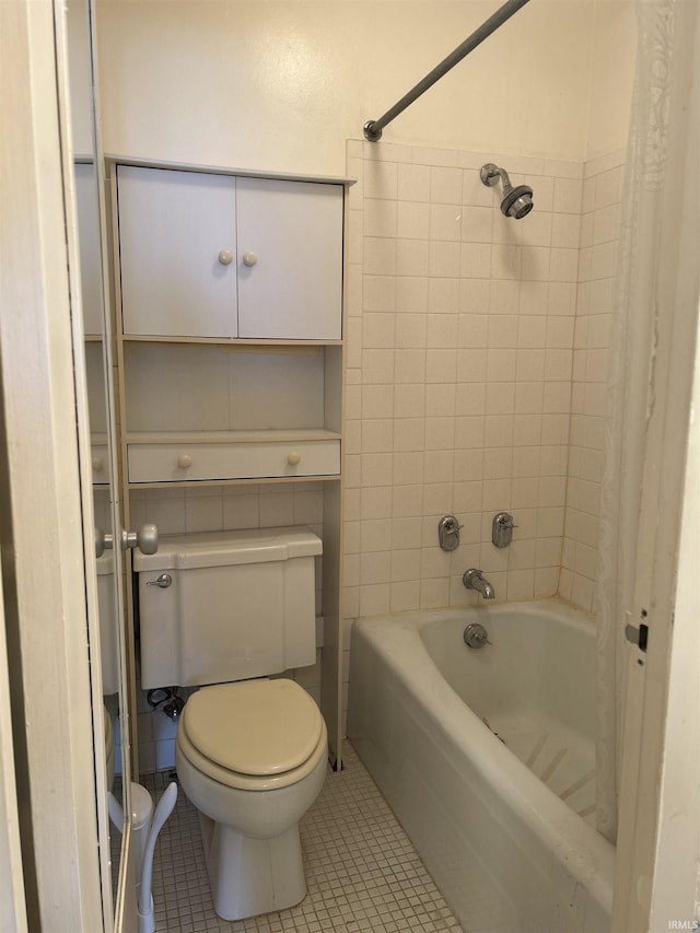 full bath featuring toilet, shower / bath combination with curtain, and tile patterned floors