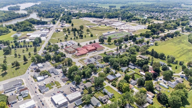 birds eye view of property with a residential view