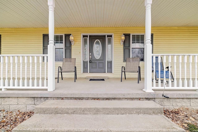 entrance to property featuring a porch