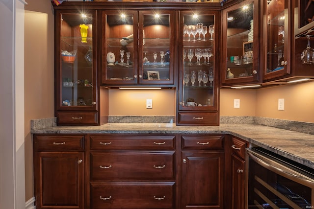 bar featuring a bar and wine cooler