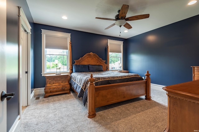 carpeted bedroom with baseboards, a ceiling fan, and recessed lighting