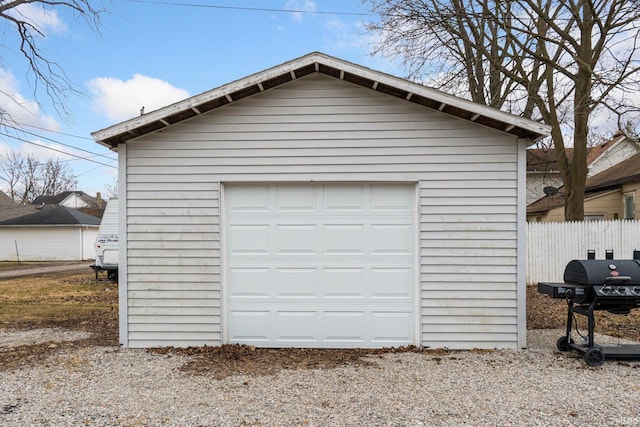 detached garage with fence