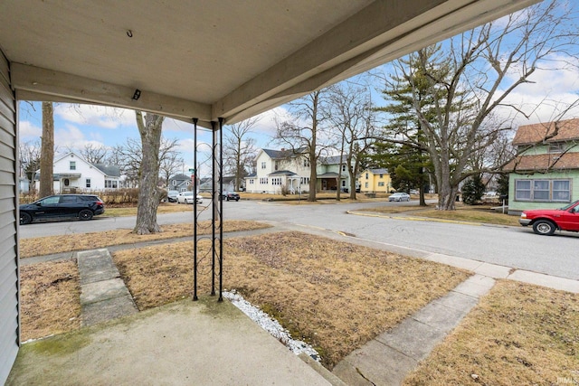 view of yard featuring a residential view